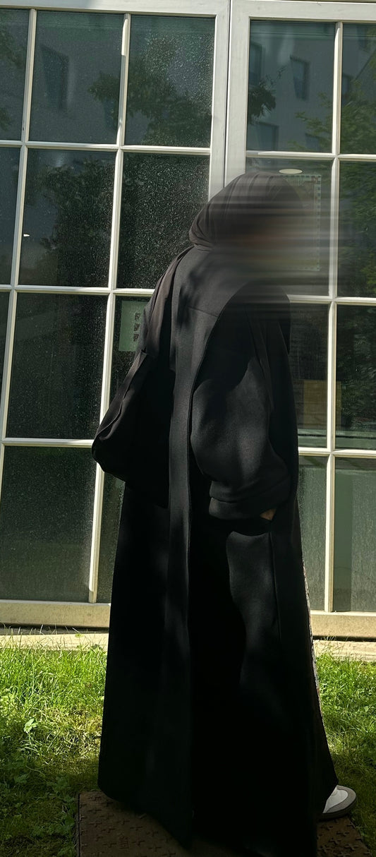 LE MANTEAU